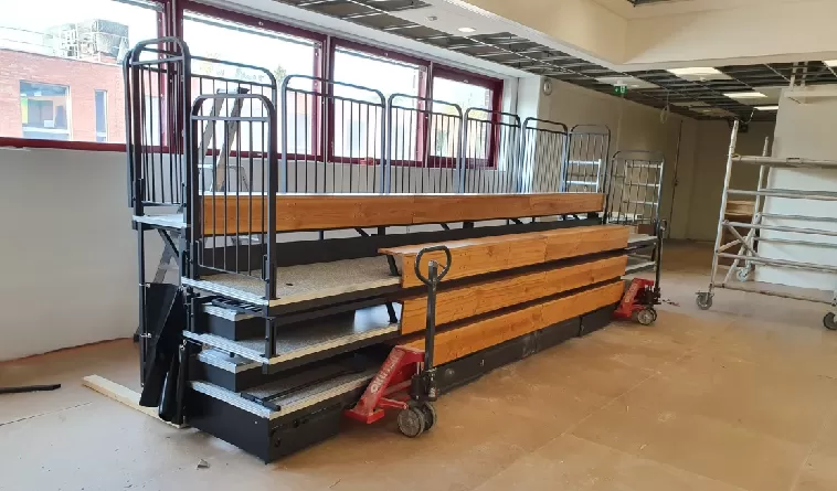 retractable seating moving type