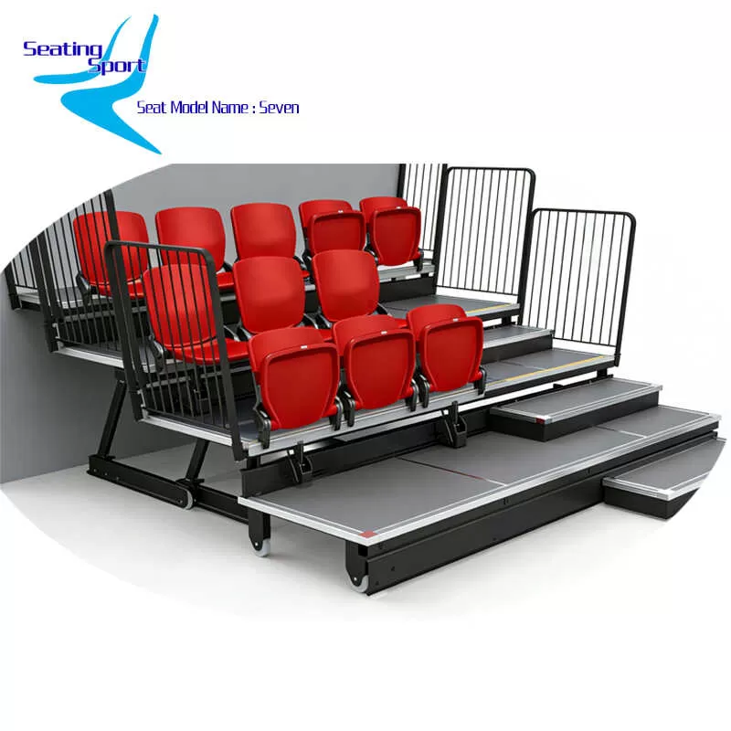 Shota foldable seats on manual/electric retractable seating system – red padded folding chairs with armrests & cup holders, telescopic tribune for indoor sports halls, multi-purpose venues