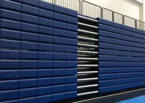 Blue bench folding bleachers (retractable seating) detail in Binalonan Gymnasium