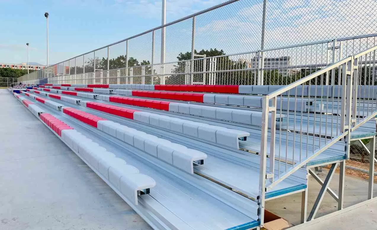 Metal bleachers with white and red HDPE seats at Nanshan Affiliated School of SUSTech in Shenzhen, China