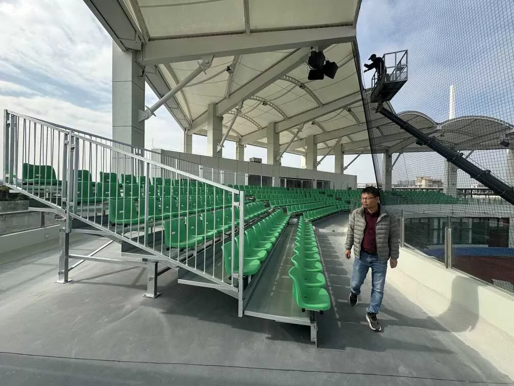 Custom metal bleacher grandstand with Spoon‑M seats, hot‑dip galvanized metal structure bleachers at Zhongshan International Baseball & Softball Center, aluminum pedal outdoor sports stadium grandstand